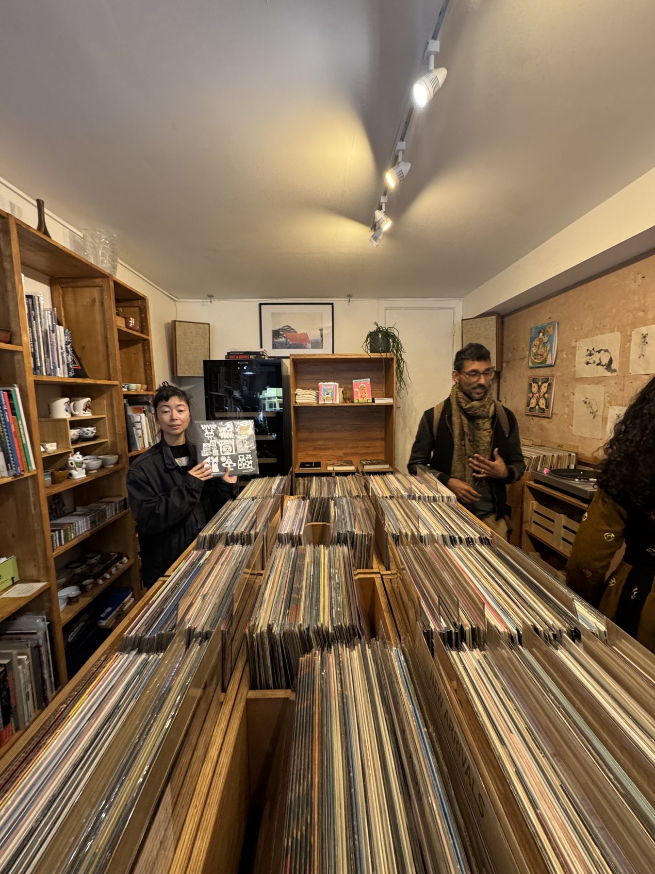 Customers digging through record crates in the shop