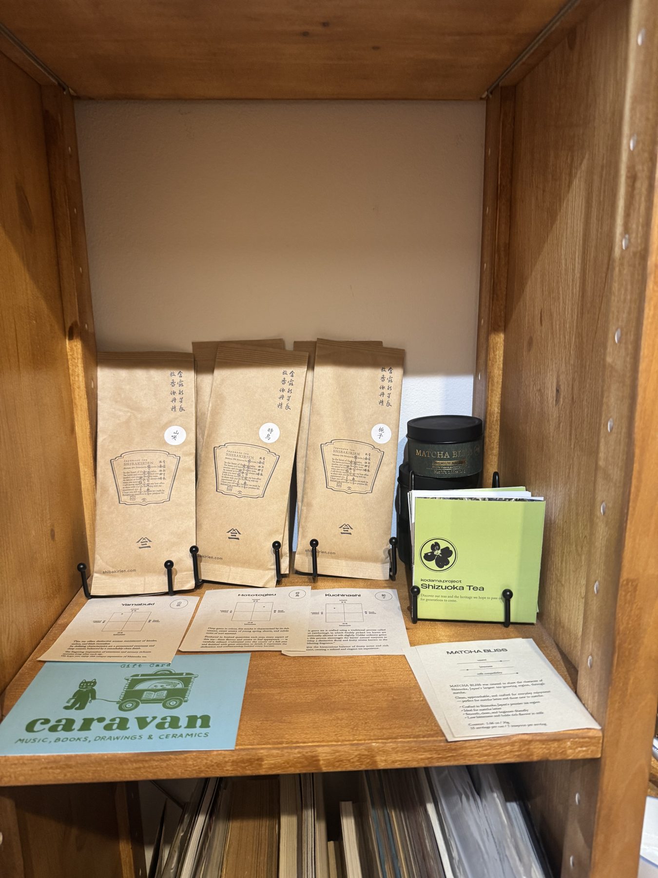 Shibakirien tea bags, Matcha Bliss tin and kodama.project Shizuoka Tea on a shop shelf