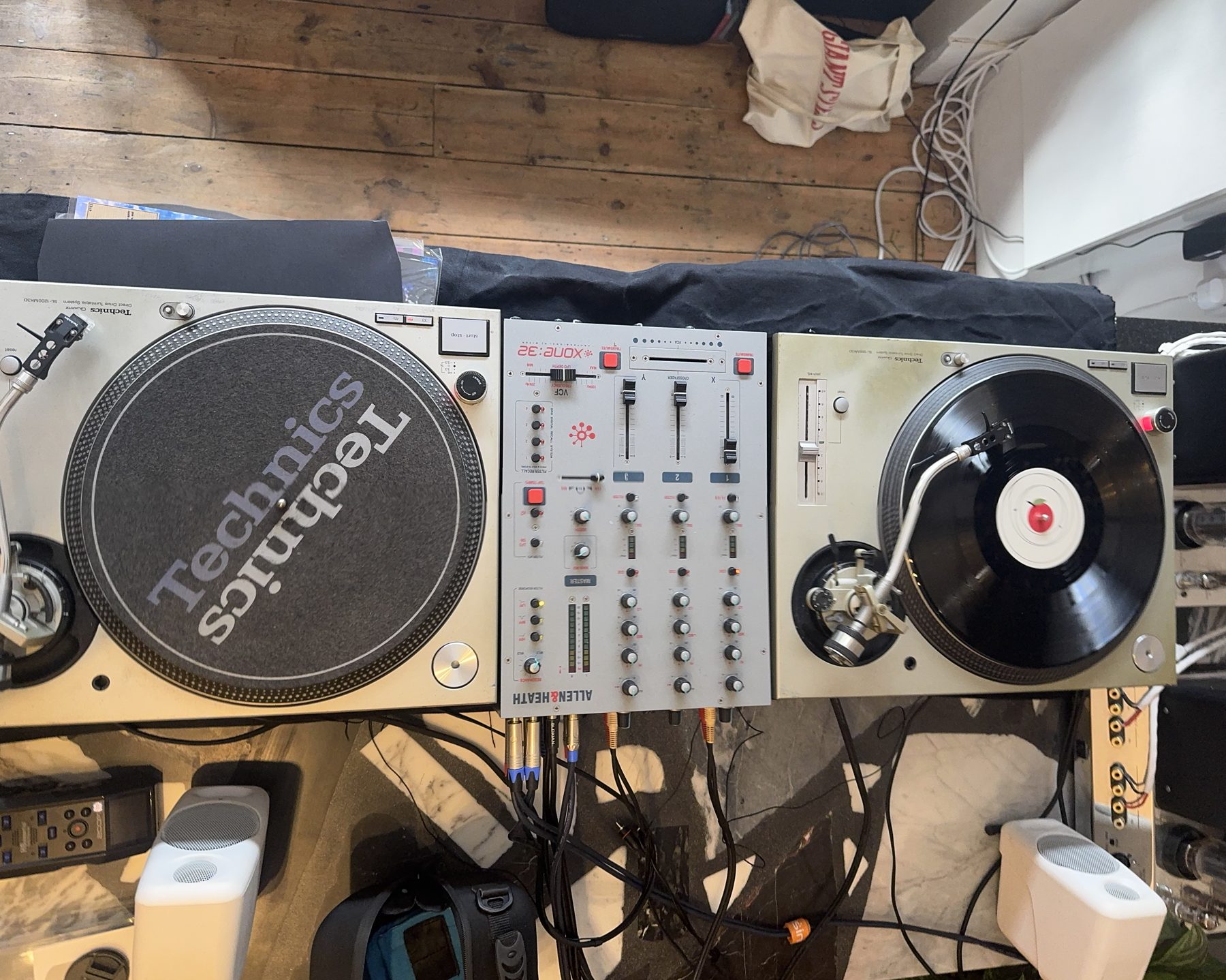 Two Technics turntables and an Allen & Heath mixer seen from above